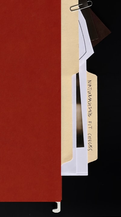 collage of red, black, white, and tan paper